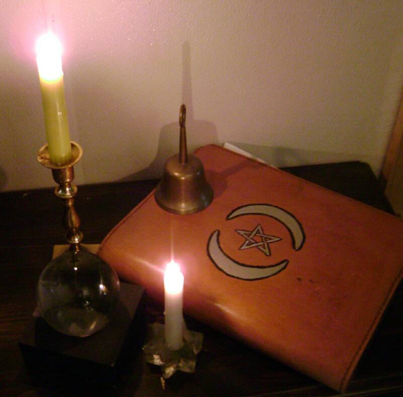 Bell Book And Candle Flame